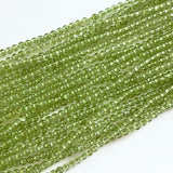 Runde Peridot perler 2 mm – ca. 195 stk. på streng i klar grøn nuance