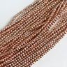Rosaguldfarvede facetslebne Hæmatit perler 2 mm – ca. 195 stk. på streng