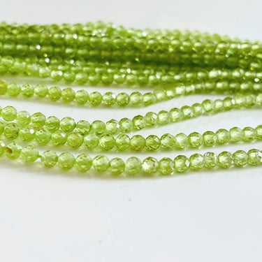 3 mm facetslebne Peridot perler – ca. 135 stk. på streng