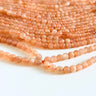 3 mm Peach Moonstone perler – ca. 124 stk. på streng
