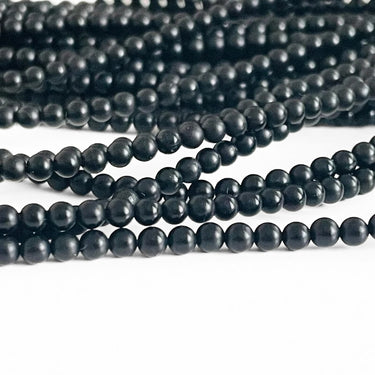 Mat sort onyx perler – 3 mm, hel streng