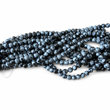 6 mm Snowflake obsidian perler med sorte og gråhvide mønstre