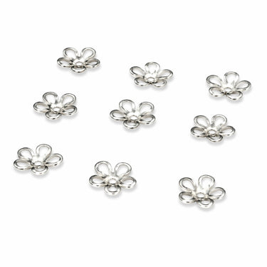 Skålformede blomster beadcaps i forsølvet metal 7 mm