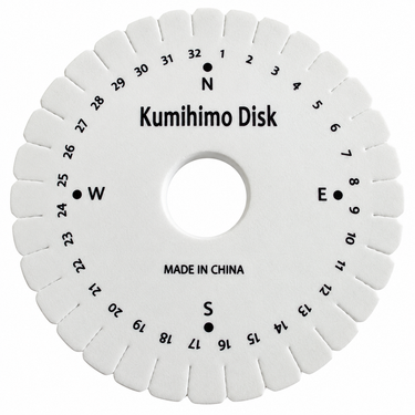 Kumihimo disk på hvid baggrund