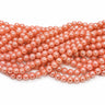 10 mm laksefarvede glasperler – bundt af strenge
