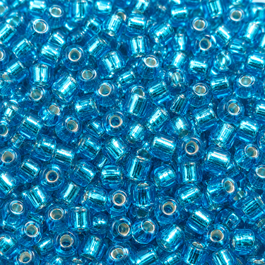 4 mm aqua Silverline rocailles perler - nærbillede