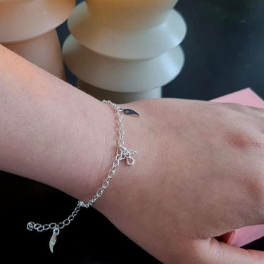 Sølv armbånd med charms