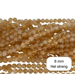 Hel streng 8 mm gul Citrin perler. der er ca. 47 perler på strengen som måler ca. 39 cm.