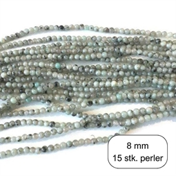 4 mm Kiwi agat perler. Her køber du en pose med 15 stk. men vi sælger dem også i hele strenge.