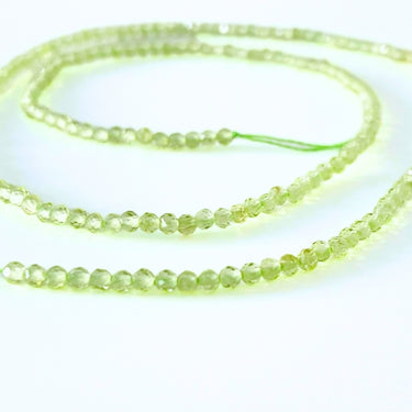 2 mm Peridot facet - Hel streng