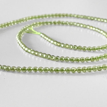 2 mm Peridot - Hel streng