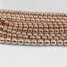 Hæmatit perler i lys rosaguld – ca. 4 mm, hel streng