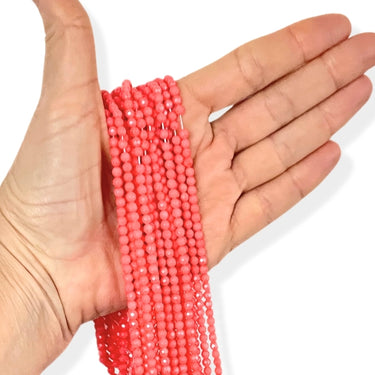 4 mm Koralperler, facet - Hel streng