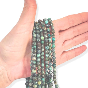 Afrikansk turkis, facet 6 mm - Hel streng