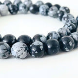 Snowflake Obsidian, 8 mm perler - Hel streng
