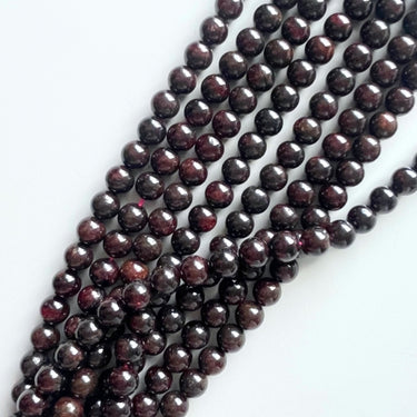 8 mm Granat perler - Hel streng