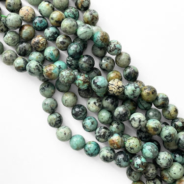 Afrikansk turkis, facet 10 mm - Hel streng