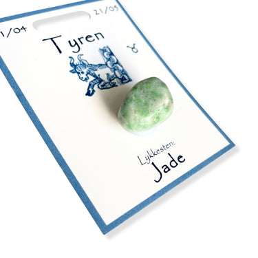 Stjernetegns lykkesten. Bagpå kortet er en beskrivelse  om stenen og stjernetegnet.