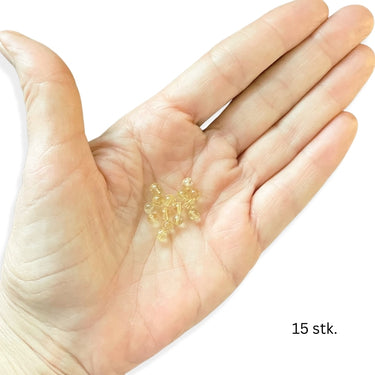 runde gule perler i trekantbakke