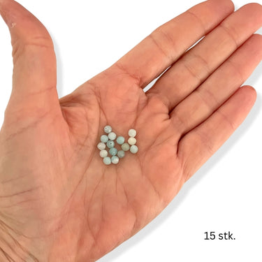 runde stenperler i mint og blå toner