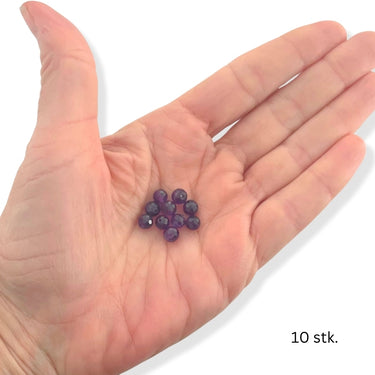 runde lilla ametyst stenperler