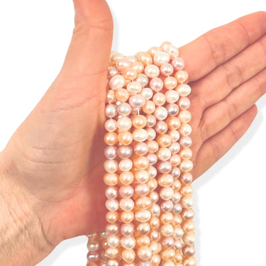 ovale perler i rosa og fersken