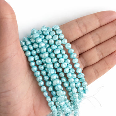 Ferskvandsperler turkis 5-7 mm - Hel streng