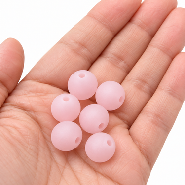 12 mm matte rosa glasperler i hånd
