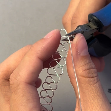Fingerring lavet af sølvtråd
