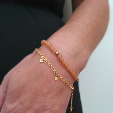 Forgyldt armbånd med små mønter