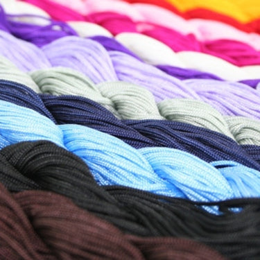Knyttesnor, Brun polyester ca. 1,5 mm, 14 meter