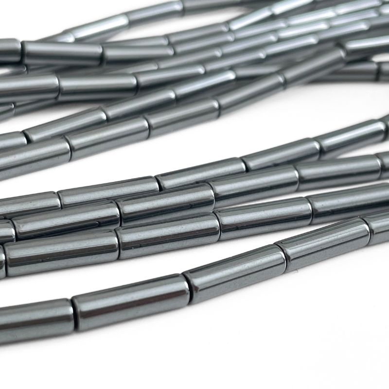 Lange hæmatit rørperler 4x13 mm i blank metalgrå